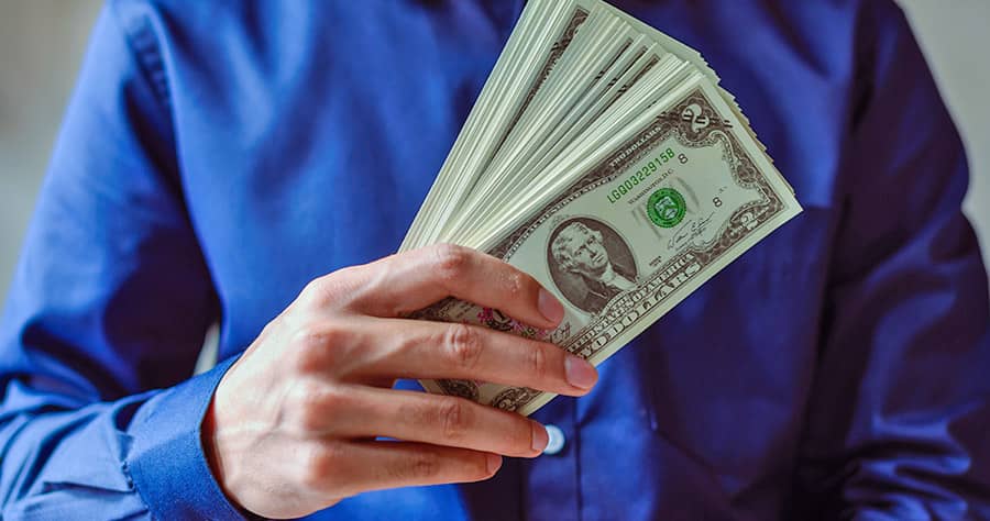 Hotel Finance Stack of Bills Hotel Finance Stack of Dollar Bills